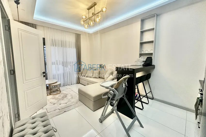 Kupuj  Apartament z jedną sypialnią w Alanya, dzielnica Oba - umeblowany i z przeszklonym balkonem  3 