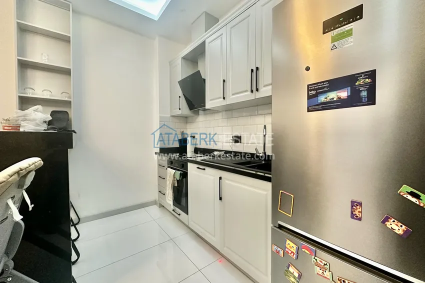 Kupuj  Apartament z jedną sypialnią w Alanya, dzielnica Oba - umeblowany i z przeszklonym balkonem  4 