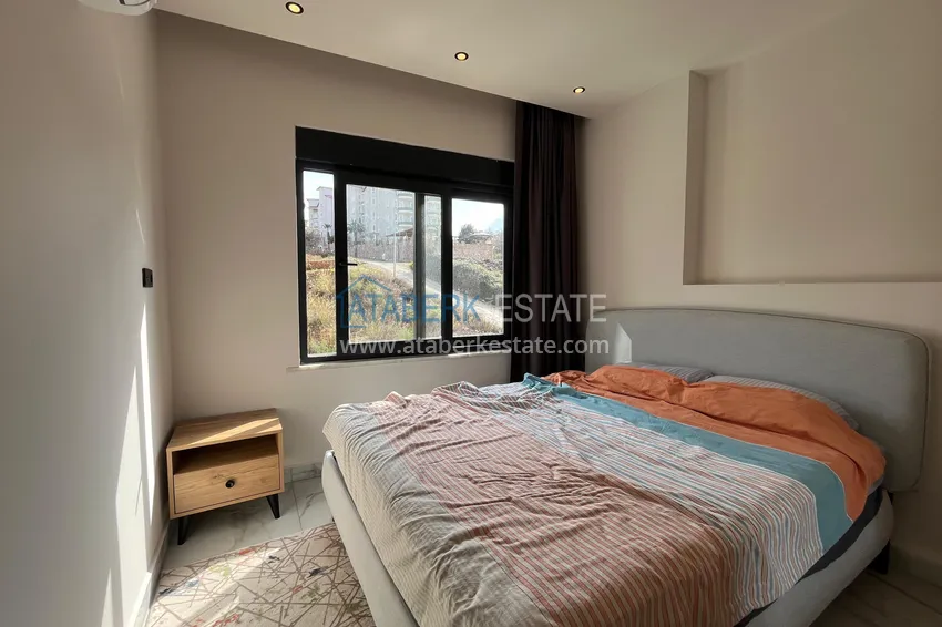 Kupuj  Umeblowany apartament 1+1 z widokiem na góry w okolicy Górnej Oba 9 