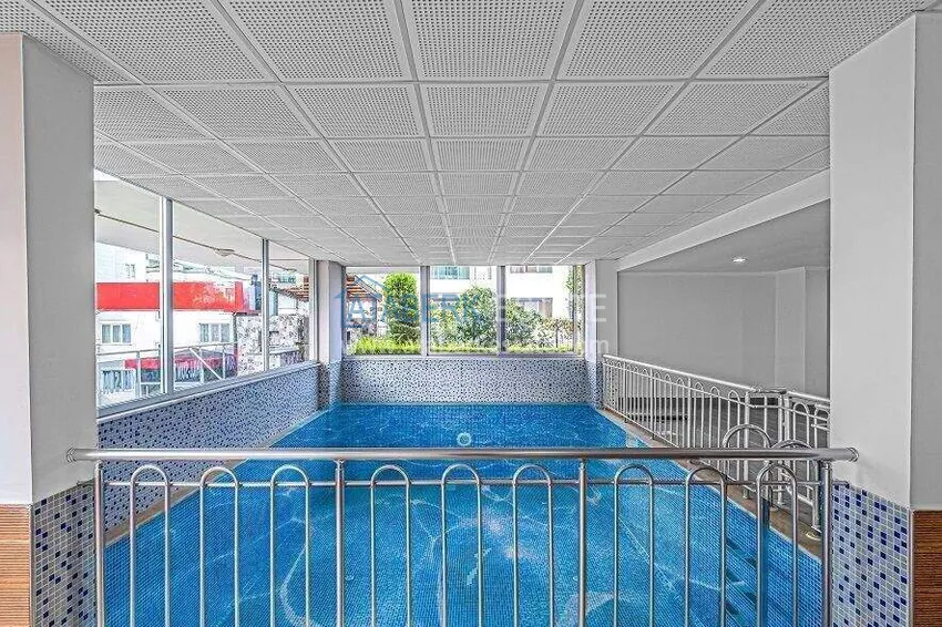 Umeblowany apartament 1+1 z widokiem na góry w Tosmur - 600 m do nabrzeża 12