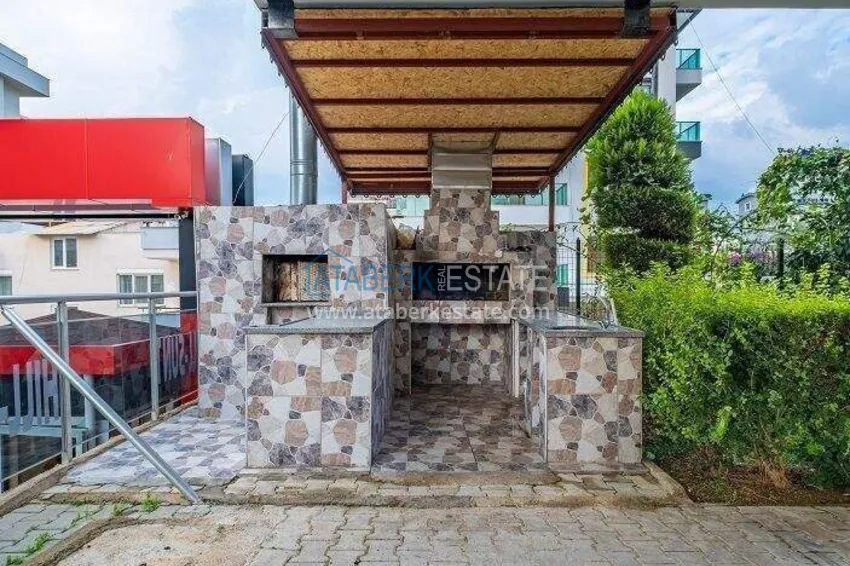 Umeblowany apartament 1+1 z widokiem na góry w Tosmur - 600 m do nabrzeża 9