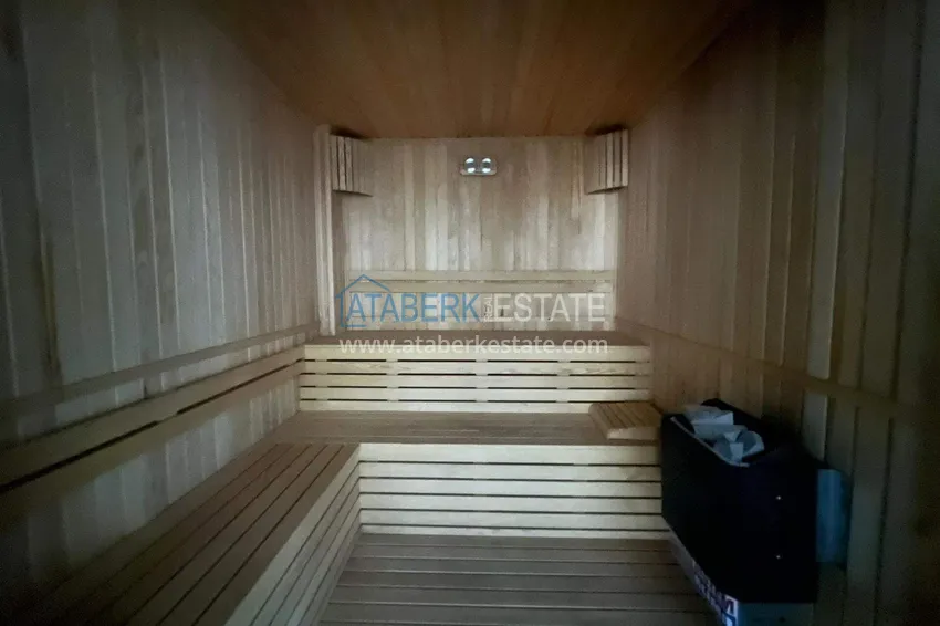 Dwupoziomowy penthouse 2+1 w Avsallar z meblami w nowoczesnym kompleksie 11 