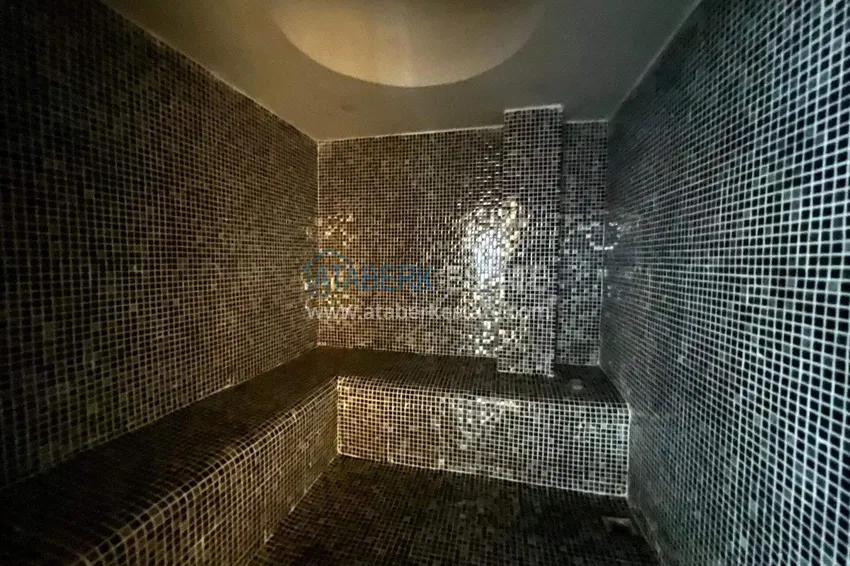 Dwupoziomowy penthouse 2+1 w Avsallar z meblami w nowoczesnym kompleksie 12 