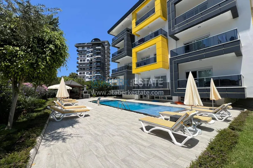 Dwupoziomowy penthouse 2+1 w Avsallar z meblami w nowoczesnym kompleksie 2 