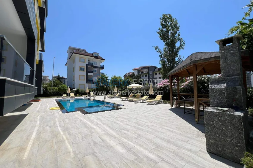 Dwupoziomowy penthouse 2+1 w Avsallar z meblami w nowoczesnym kompleksie 6 