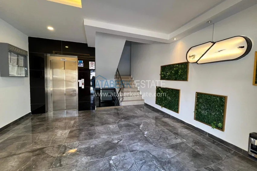 Dwupoziomowy penthouse 2+1 w Avsallar z meblami w nowoczesnym kompleksie 9 