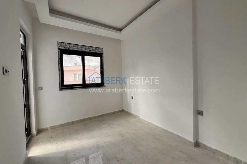 Kupuj  Apartament 1+1 57 m² z widokiem na morze w Mahmutlar - nowoczesny kompleks mieszkalny 11 