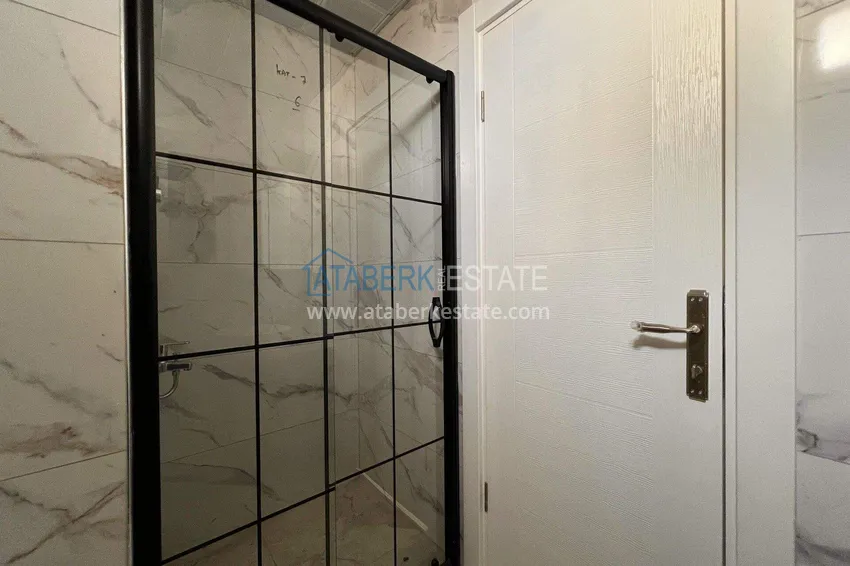 Kupuj  Apartament 1+1 57 m² z widokiem na morze w Mahmutlar - nowoczesny kompleks mieszkalny 14 