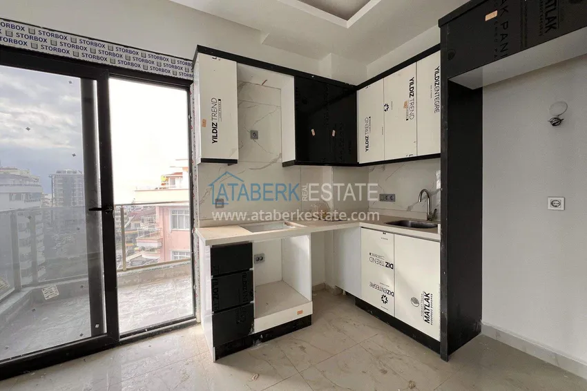 Kupuj  Apartament 1+1 57 m² z widokiem na morze w Mahmutlar - nowoczesny kompleks mieszkalny 4 