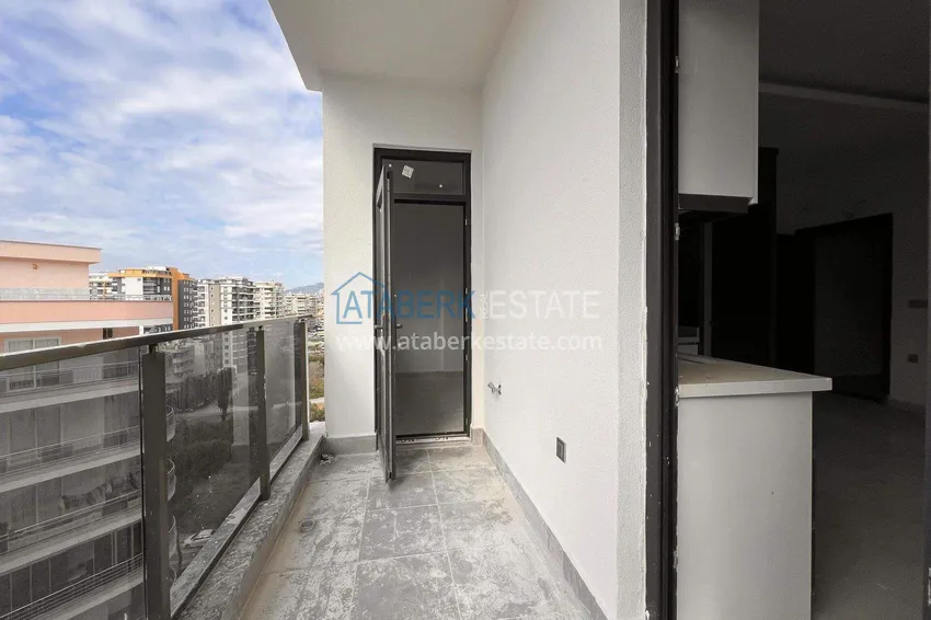 Kupuj  Apartament 1+1 57 m² z widokiem na morze w Mahmutlar - nowoczesny kompleks mieszkalny 7 