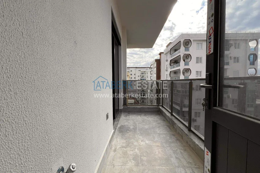 Kupuj  Apartament 1+1 57 m² z widokiem na morze w Mahmutlar - nowoczesny kompleks mieszkalny 8 