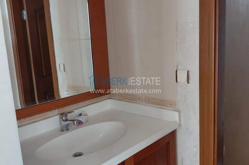Kupuj  Apartament 2+1 przy plaży w Mahmutlar 11 