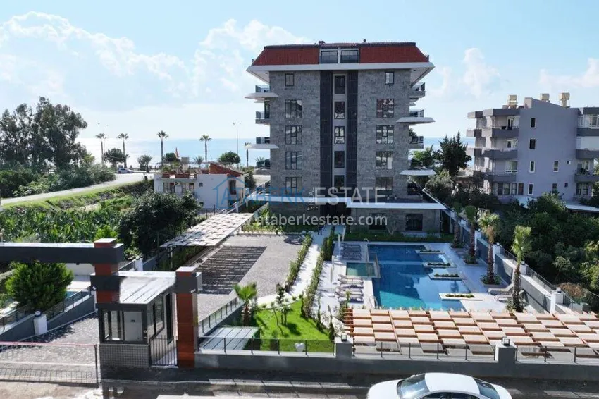 Apartament 1+1 z widokiem na morze i fortecę przy plaży w Kestel 9 