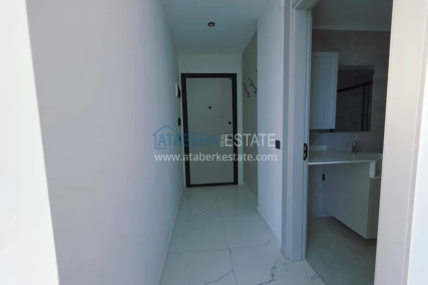 Kupuj  Apartament 1+1 z widokiem na morze i fortecę przy plaży w Kestel 2 