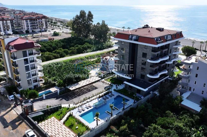 Apartament 1+1 z widokiem na morze i fortecę przy plaży w Kestel 6 