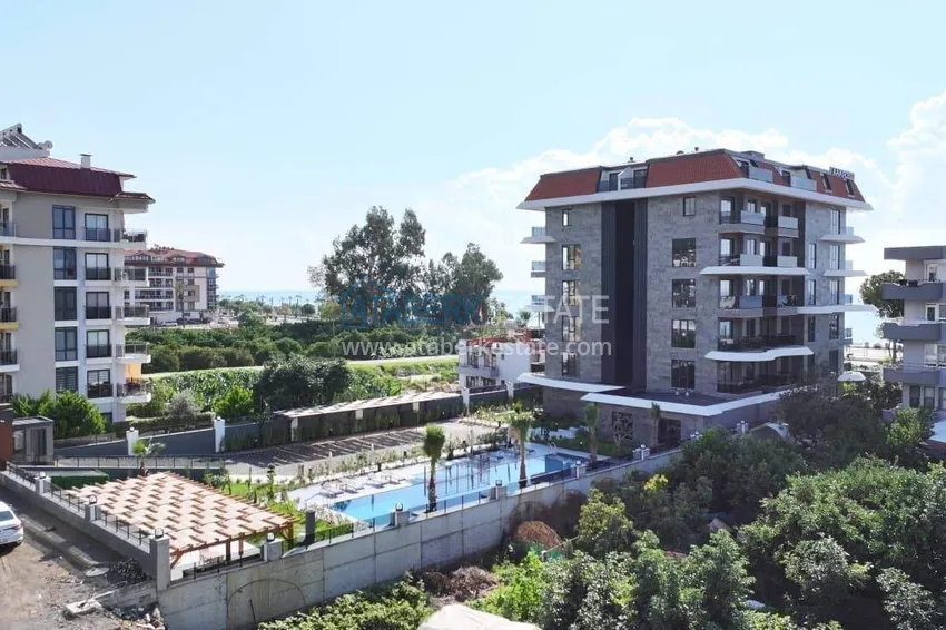 Apartament 1+1 z widokiem na morze i fortecę przy plaży w Kestel 8 