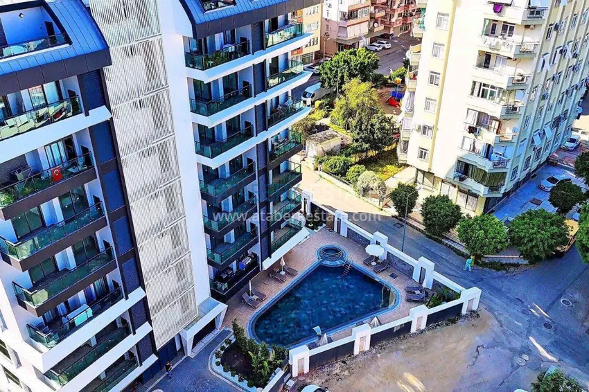 Nieruchomości od dewelopera! Kompleks mieszkaniowy w budowie w centrum Alanyi, plaża Kleopatra 9 