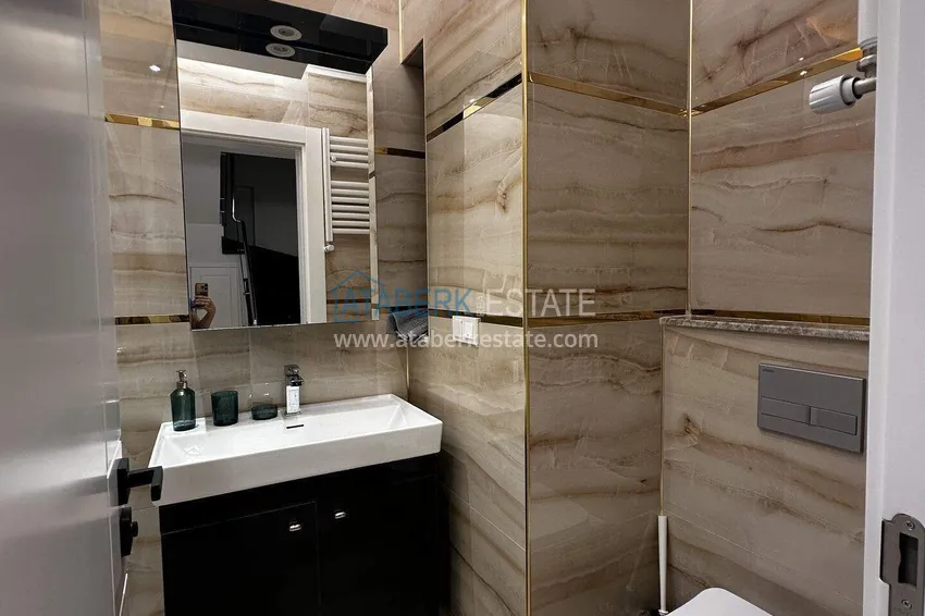 Kupuj  Dwupoziomowy penthouse 2+1 z widokiem na morze w centrum Mahmutlar - możliwe są raty do 12 miesięcy 15 