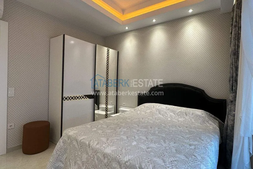 Kupuj  1+1 mieszkanie 70 m² w centrum Mahmutlar — umeblowane, przeszklony balkon, raty do 1 roku 10 