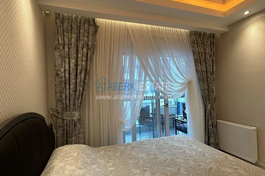 Kupuj  1+1 mieszkanie 70 m² w centrum Mahmutlar — umeblowane, przeszklony balkon, raty do 1 roku 11 