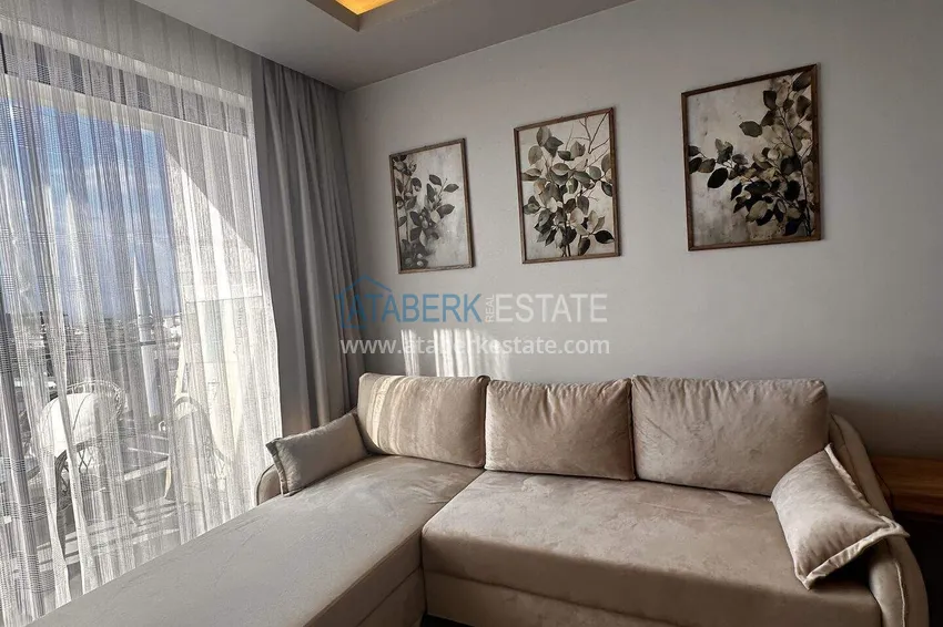Kupuj  Apartament 1+1 w centrum Alanyi - umeblowany i z widokiem na morze, dostępne są raty  3 