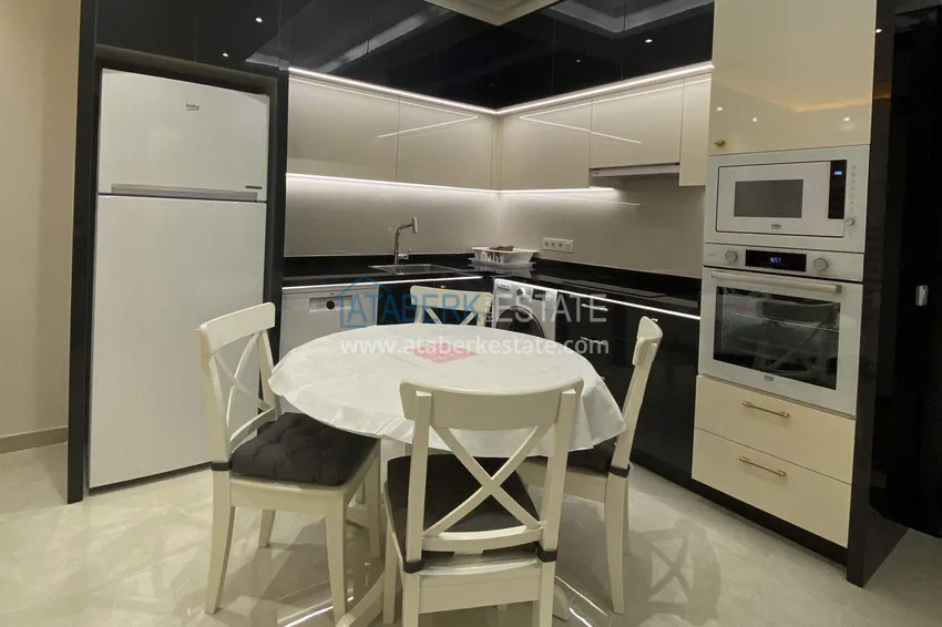 Kupuj  1+1 mieszkanie 70 m² w centrum Mahmutlar — umeblowane, przeszklony balkon, raty do 1 roku 4 