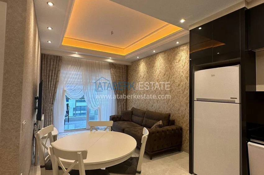 Kupuj  1+1 mieszkanie 70 m² w centrum Mahmutlar — umeblowane, przeszklony balkon, raty do 1 roku 6 