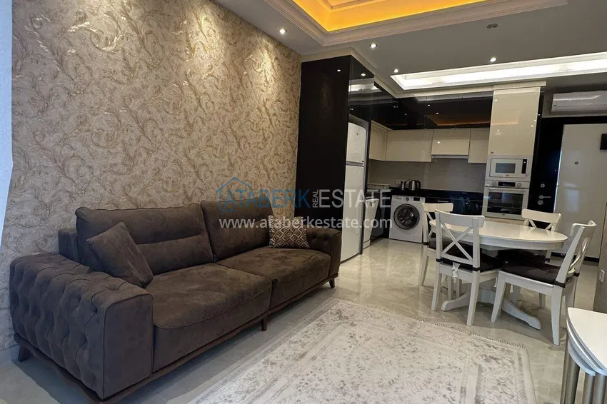 Kupuj  1+1 mieszkanie 70 m² w centrum Mahmutlar — umeblowane, przeszklony balkon, raty do 1 roku 7 