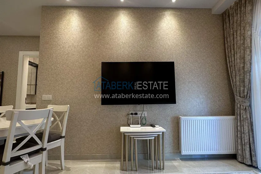 Kupuj  1+1 mieszkanie 70 m² w centrum Mahmutlar — umeblowane, przeszklony balkon, raty do 1 roku 8 