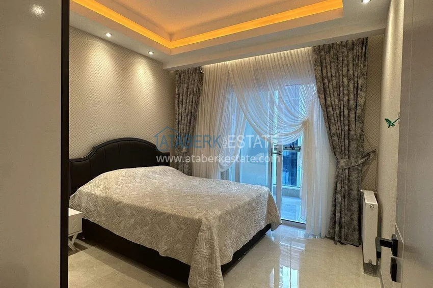 Kupuj  1+1 mieszkanie 70 m² w centrum Mahmutlar — umeblowane, przeszklony balkon, raty do 1 roku 9 