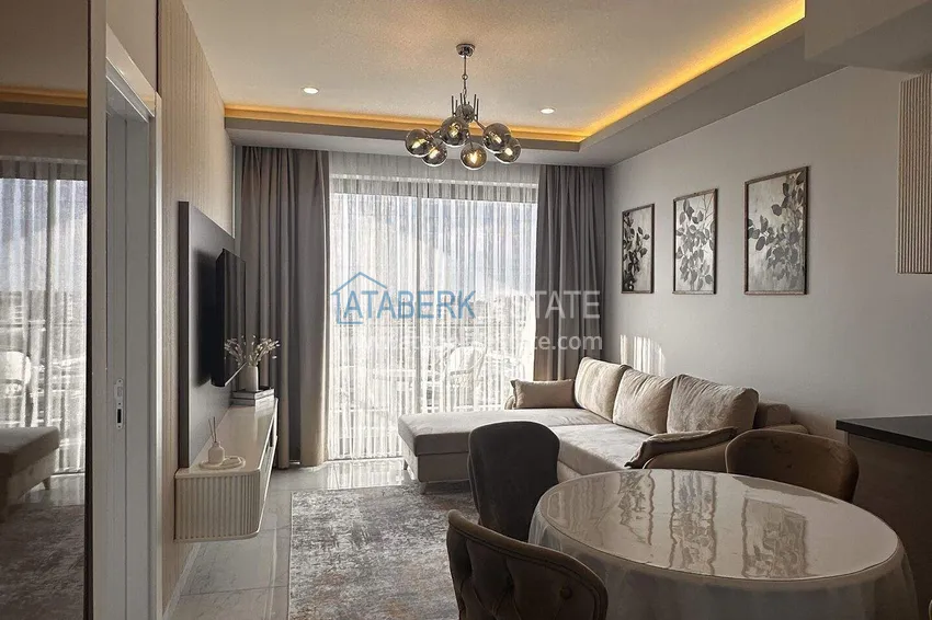 Kupuj  Apartament 1+1 w centrum Alanyi - umeblowany i z widokiem na morze, dostępne są raty  9 