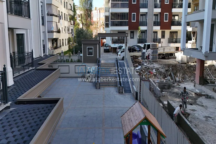Nowy projekt inwestycyjny kompleksu mieszkalnego z bogatą infrastrukturą w centrum Alanyi 14 