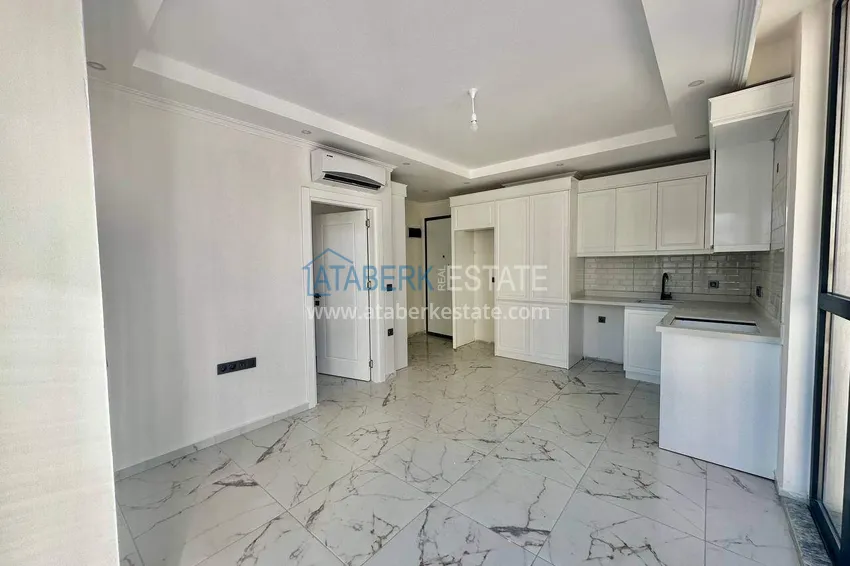 Kupuj  Apartament 1+1 w Demirtas z widokiem na morze - nieruchomości w Alanyi z pięknym wykończeniem 4 