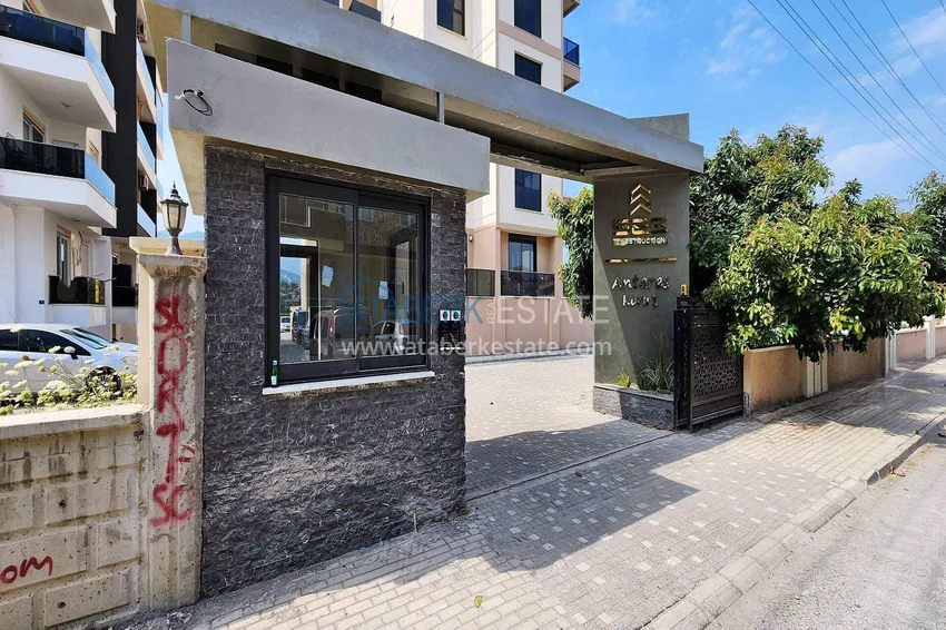 Apartament 1+1 w Gazipasa z pięknym wykończeniem w nowoczesnym kompleksie 15 