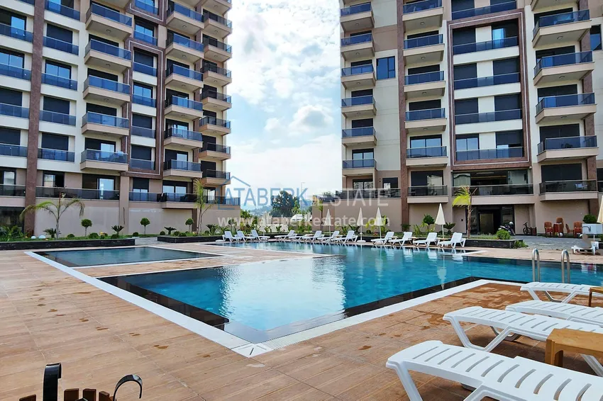 Apartament 1+1 w Gazipasa z pięknym wykończeniem w nowoczesnym kompleksie 2 