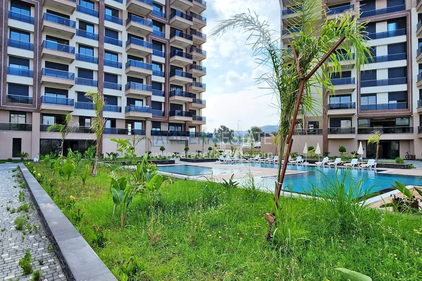 Apartament 1+1 w Gazipasa z pięknym wykończeniem w nowoczesnym kompleksie 4 