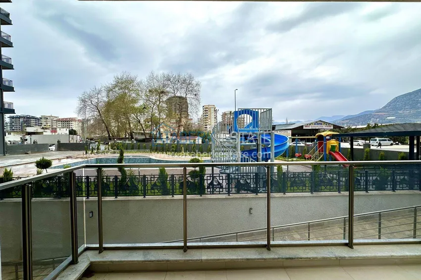 Kupuj  Apartament 1+1 z nowymi meblami w Mahmutlar - 400 metrów od morza, ulica Atatürk 11 