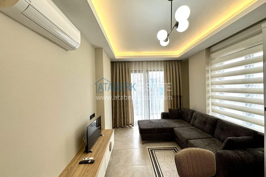 Kupuj  Apartament 1+1 z nowymi meblami w Mahmutlar - 400 metrów od morza, ulica Atatürk 4 