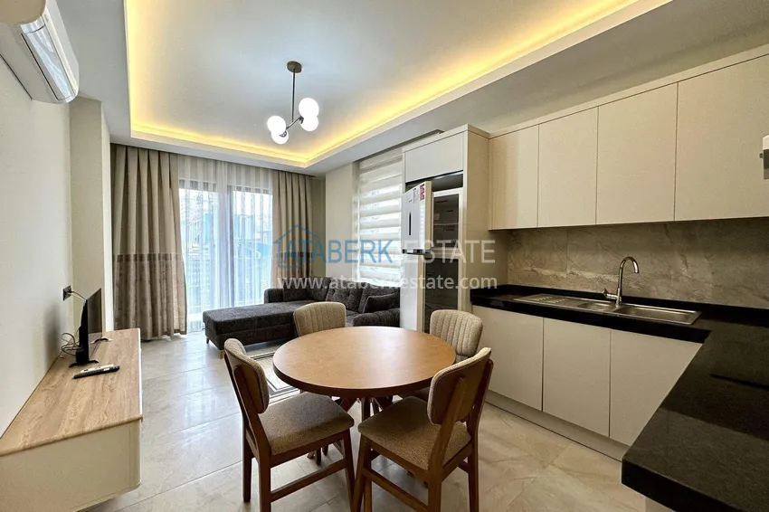 Kupuj  Apartament 1+1 z nowymi meblami w Mahmutlar - 400 metrów od morza, ulica Atatürk 5 