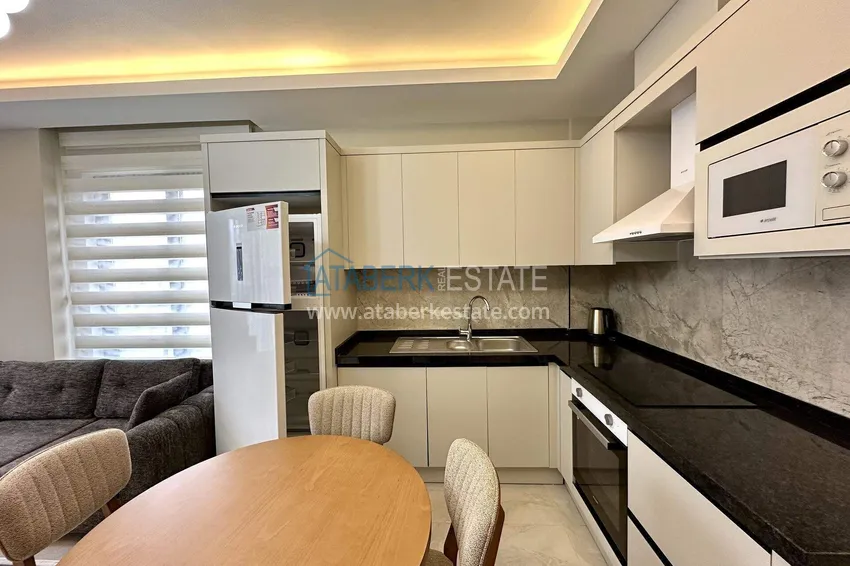 Kupuj  Apartament 1+1 z nowymi meblami w Mahmutlar - 400 metrów od morza, ulica Atatürk 6 