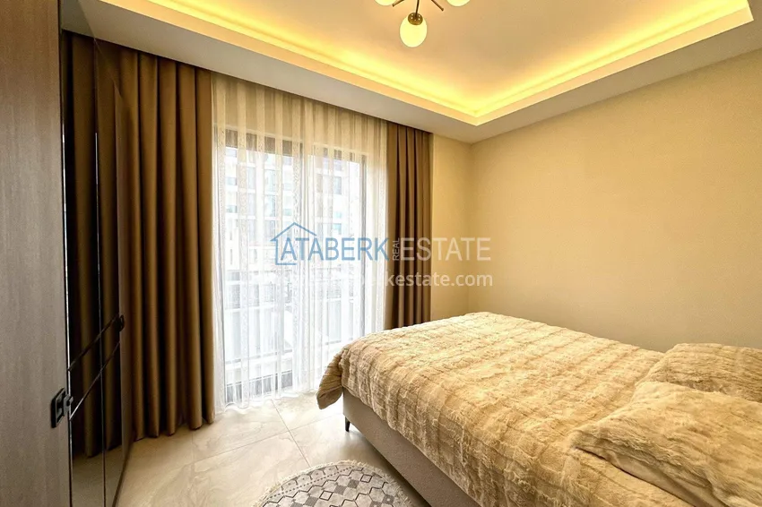 Kupuj  Apartament 1+1 z nowymi meblami w Mahmutlar - 400 metrów od morza, ulica Atatürk 9 