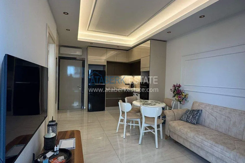Kupuj  Apartament 1+1 w pierwszej linii w Mahmutlar — umeblowany i z widokiem na morze w pięciogwiazdkowym kompleksie hotelowym 2 