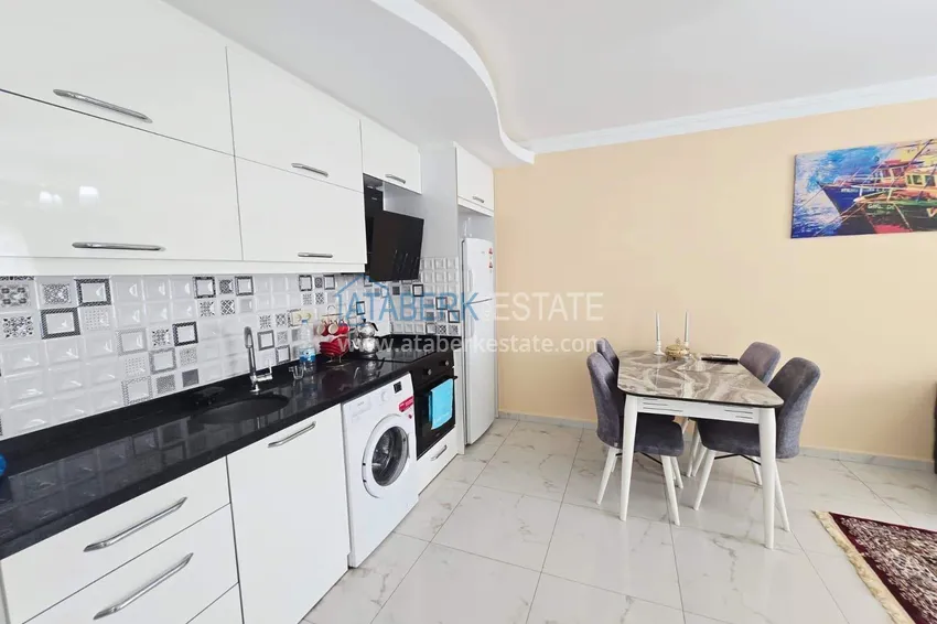 Kupuj  1+1 umeblowane mieszkanie w centrum Mahmutlar  5 