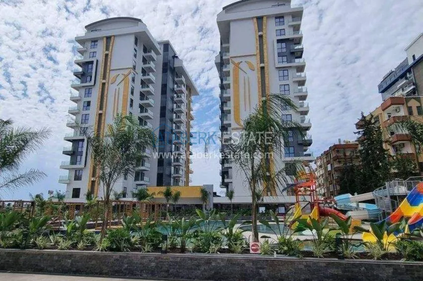 Apartament 1+1 w pierwszej linii w Mahmutlar — umeblowany i z widokiem na morze w pięciogwiazdkowym kompleksie hotelowym 8 