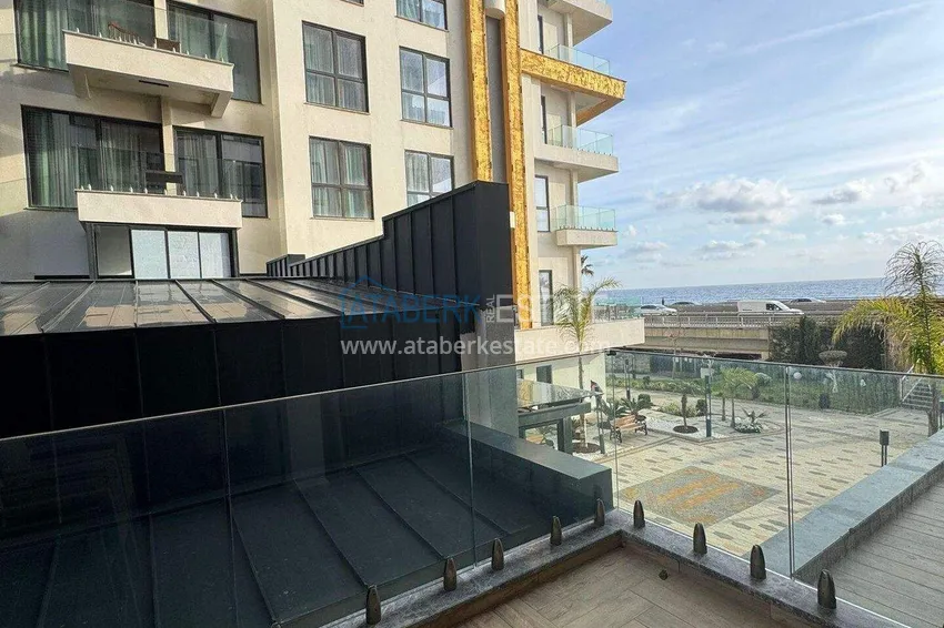 Kupuj  Apartament 1+1 w pierwszej linii w Mahmutlar — umeblowany i z widokiem na morze w pięciogwiazdkowym kompleksie hotelowym 9 