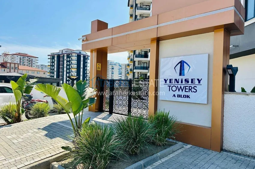 Wykończony apartament z dwiema sypialniami w kompleksie w budowie w Mahmutlar 5 