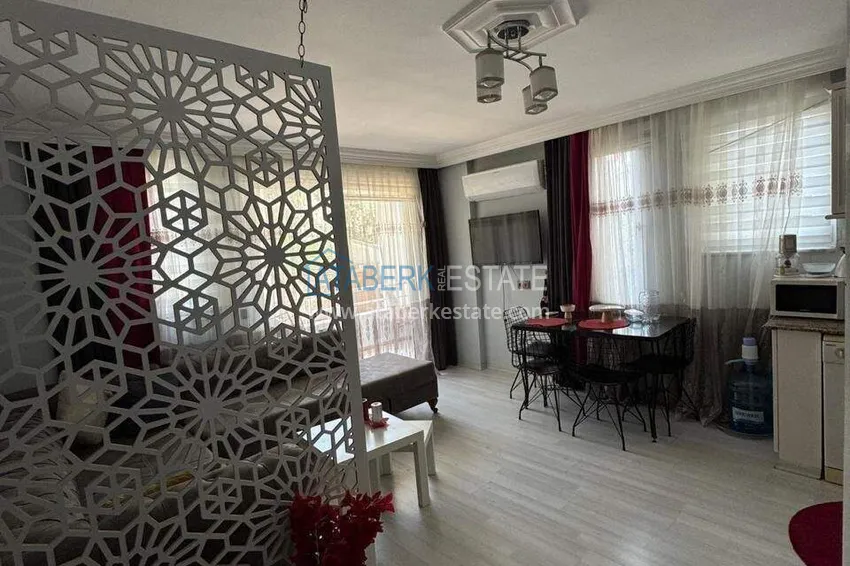 Kupuj  Korzystna cena! Apartament 1+1 w centrum Alanyi, plaża Kleopatra — nieruchomość na zezwolenie na pobyt 3 