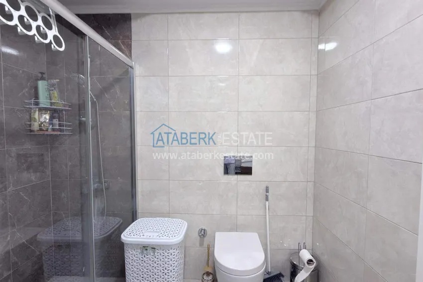 Kupuj Apartament 1+1 w centrum Mahmutlar - na 12. piętrze z meblami i widokiem na góry 10