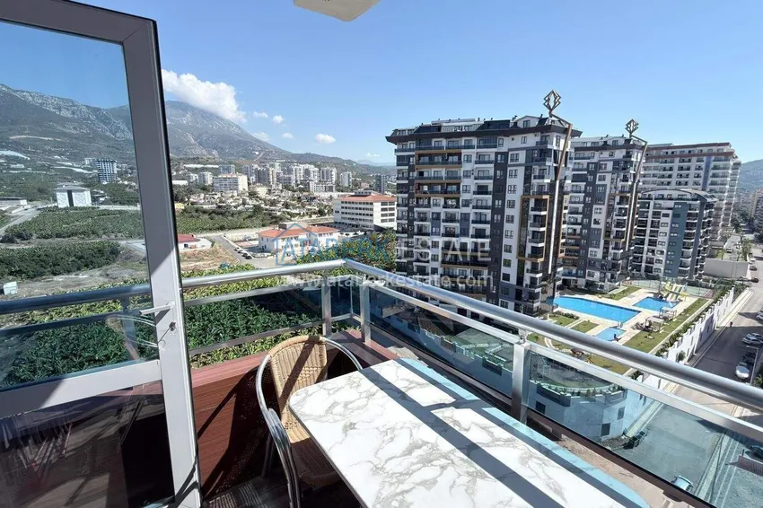 Kupuj Apartament 1+1 w centrum Mahmutlar - na 12. piętrze z meblami i widokiem na góry 13