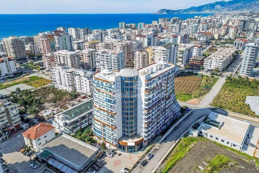 Apartament 1+1 w centrum Mahmutlar - na 12. piętrze z meblami i widokiem na góry 3